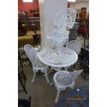 A painted cast alloy garden table and four chairs