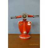 A red Vespa table lamp