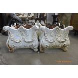 A pair of Victorian style painted cast iron garden planters