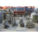 Seven concrete garden ornaments