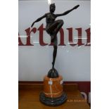 An Art Deco style bronze figure of a dancer, on rouge marble socle