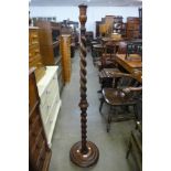 An oak barleytwist standard lamp