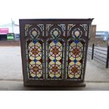 A Victorian gothic revival stained glass window, 118 x 115cms ( including frame )