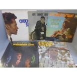 Five LP records including early Chuck Berry and Duane Eddy