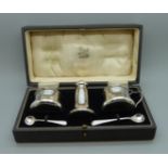 A silver cruet set in fitted case, Birmingham 1923, total weight with liners 125g