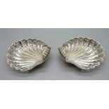 A pair of silver shell shaped dishes, engraved and pierced, Sheffield 1899, 101g