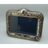 A silver photograph frame, Richard Comyns, Sheffield, 16.5cm wide