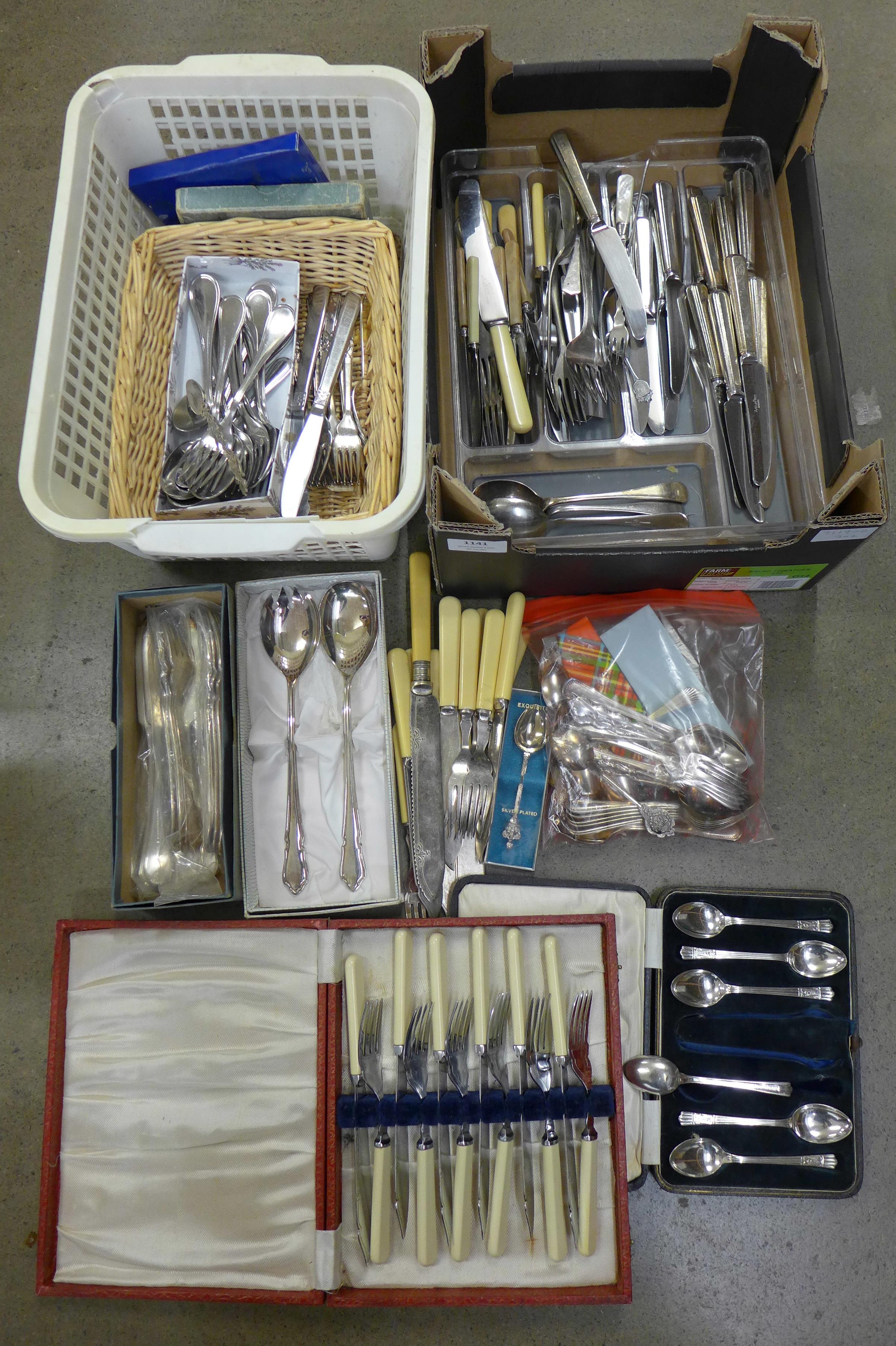 A large box of plated and stainless steel cutlery **PLEASE NOTE THIS LOT IS NOT ELIGIBLE FOR POSTING