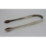 A pair of silver Hester Bateman brite cut sugar bows