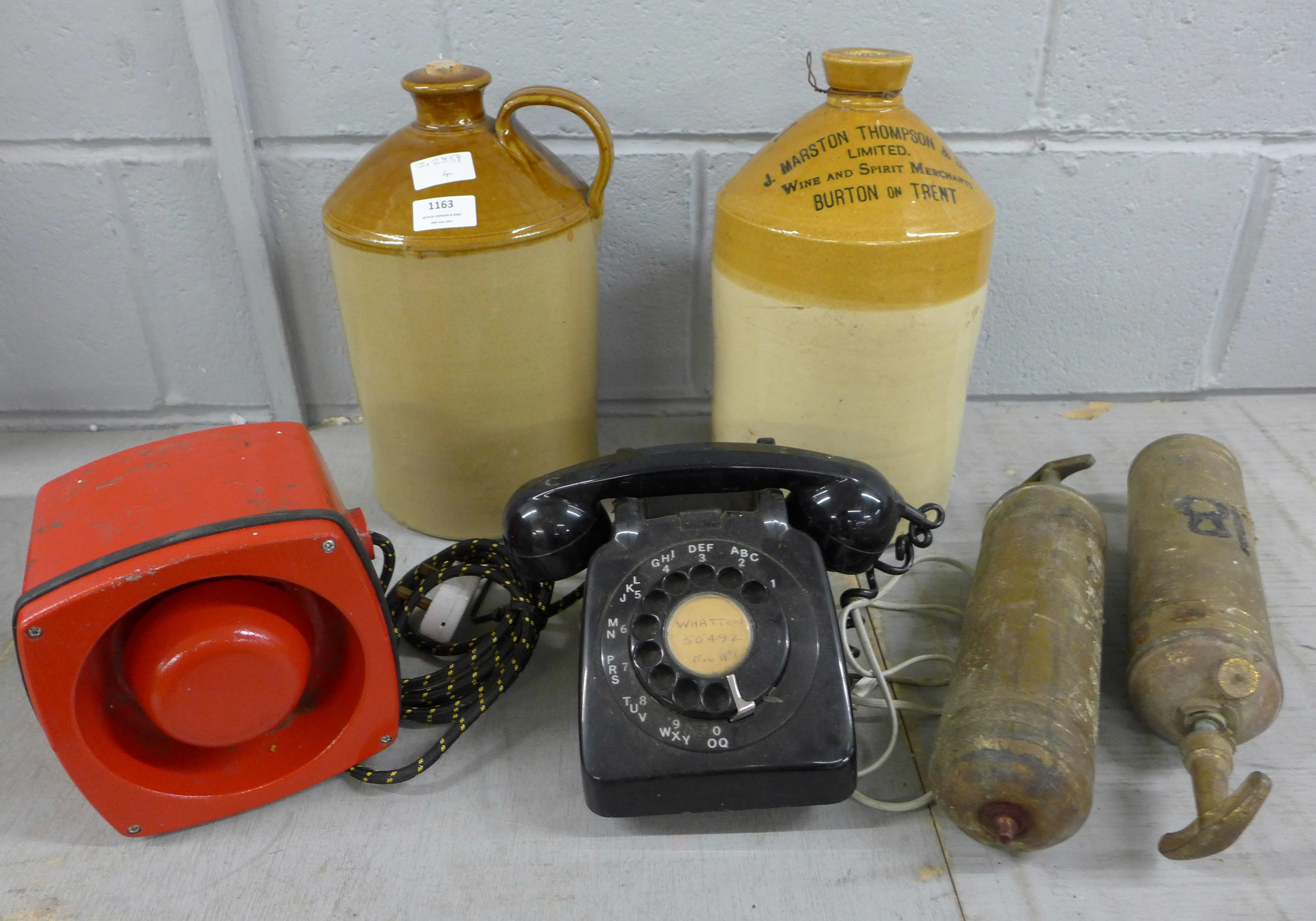 A klaxon, two fire extinguishers and two stoneware bottles **PLEASE NOTE THIS LOT IS NOT ELIGIBLE