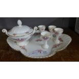 A continental floral pattern meat plate, four egg cups and sugar bowl **PLEASE NOTE THIS LOT IS