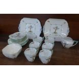 A Shelley Queen Anne Crabtree pattern tea set, six setting and two bread and butter plates, one