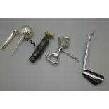 Four golf related corkscrews and bottle openers