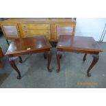 A pair of Chippendale style inlaid mahogany lamp tables