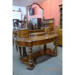 A Victorian figured walnut Duchess dressing table