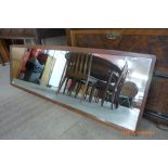 A G-Plan teak framed mirror