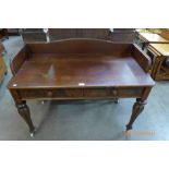 A George IV mahogany two drawer writing table