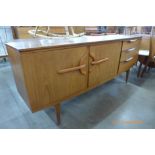 A Beautility teak sideboard