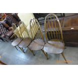 A set of four Ercol Golden Dawn elm and beech Quaker chairs