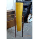 A teak and orange fibreglass rocket lamp