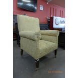 A Victorian mahogany and fabric upholstered armchair