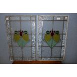 A pair of Art Nouveau stained glass window panes