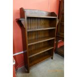 An Arts and Crafts oak open bookcase