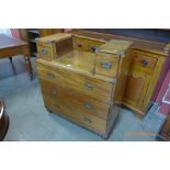 A Victorian teak and brass mounted military campaign chest