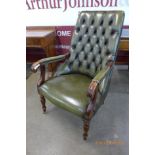 A Regency style mahogany and green leather library chair