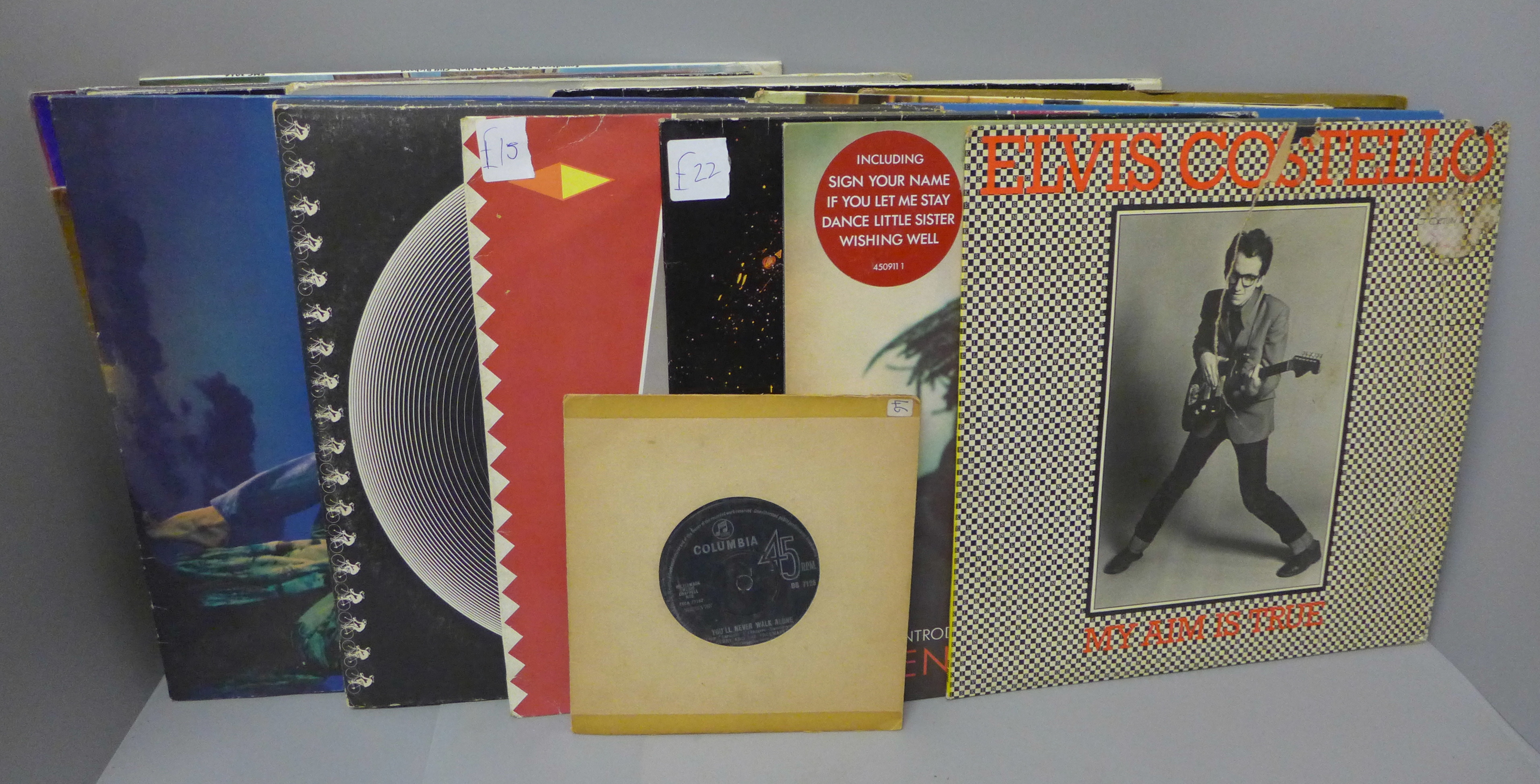 A collection of pop and easy listening records, including Queen, Simply Red and Otis Redding