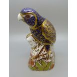 A Royal Crown Derby paperweight, Bronze Winged Parrot, 18cm, gold stopper and red Royal Crown