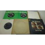 Twenty-four The Beatles and related 7" singles