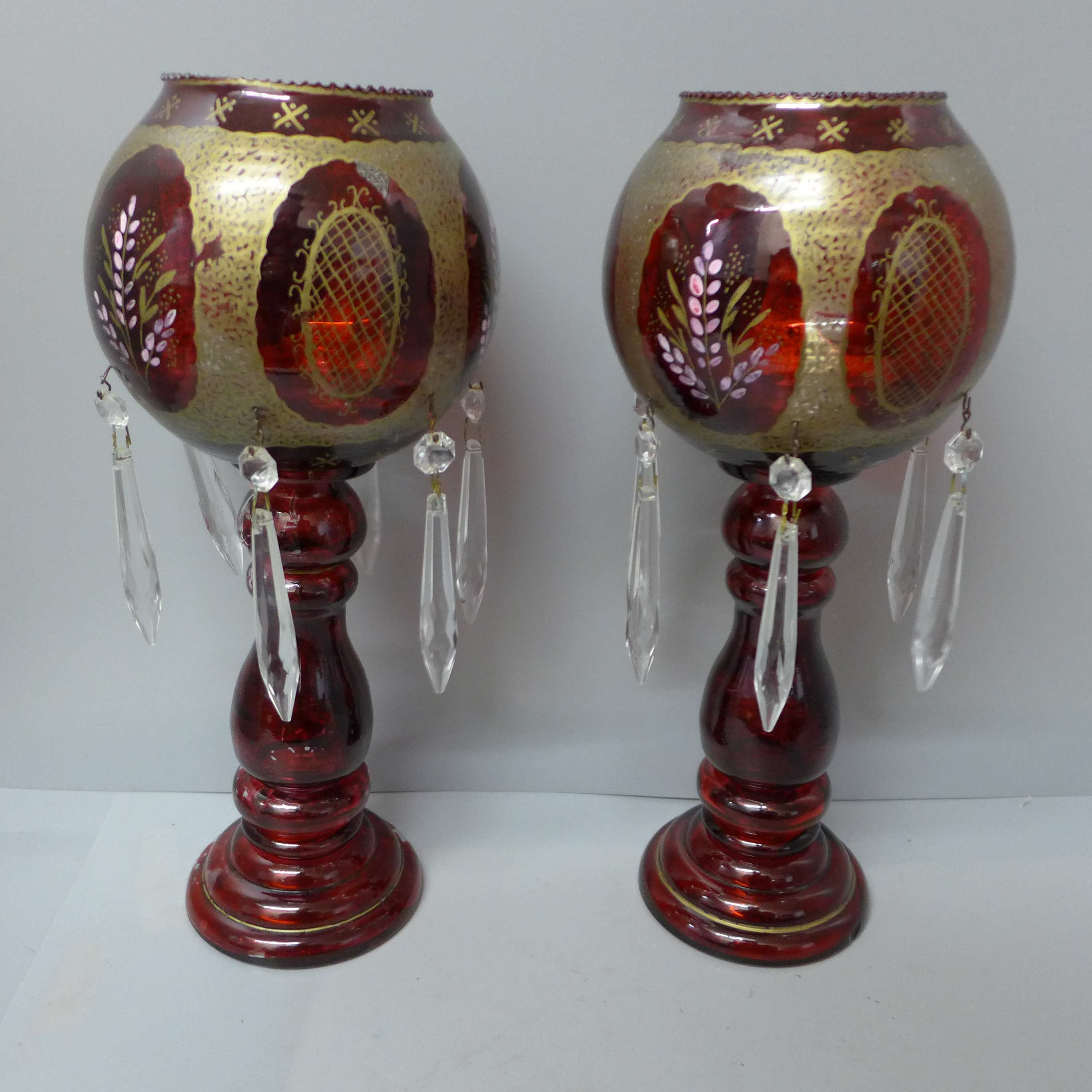 A pair of 'ruby' glass lustres, 32.5cm