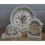 Three Portmeirion clocks; two mantel and one wall