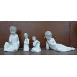 Four Nao figures of children