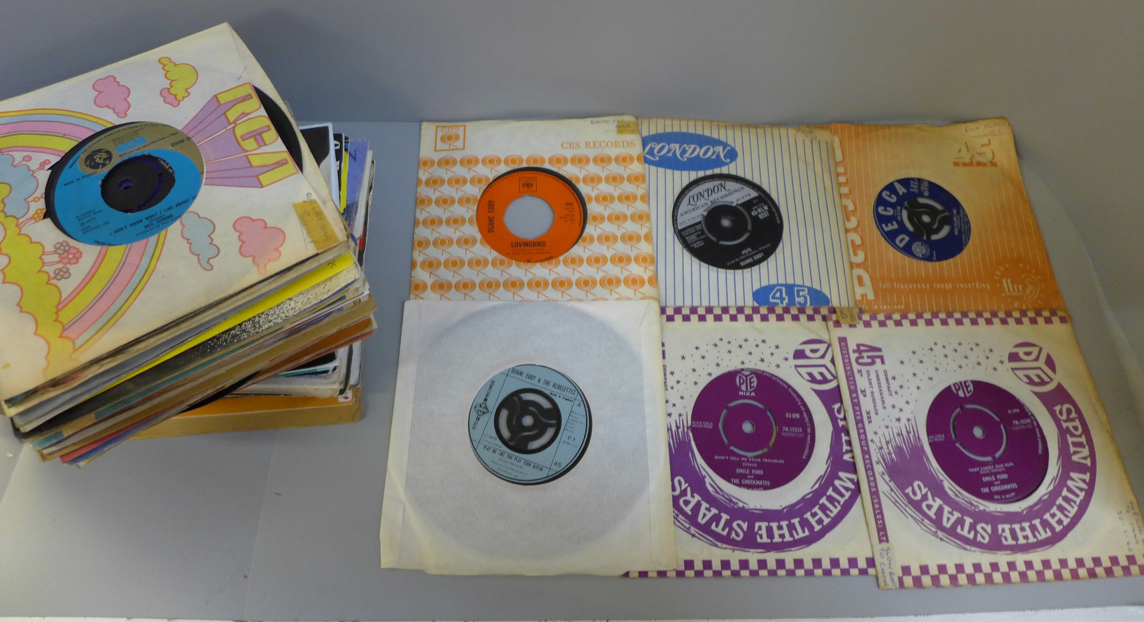 Over fifty 1950's to 1970's rock n roll 7" singles
