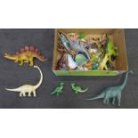 A collection of fifty model dinosaurs including Invicta Plastics, Disney, etc.