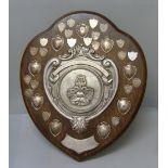 A large oak Pianoforte Trophy shield, Birmingham Music Festival, mounted with mainly silver