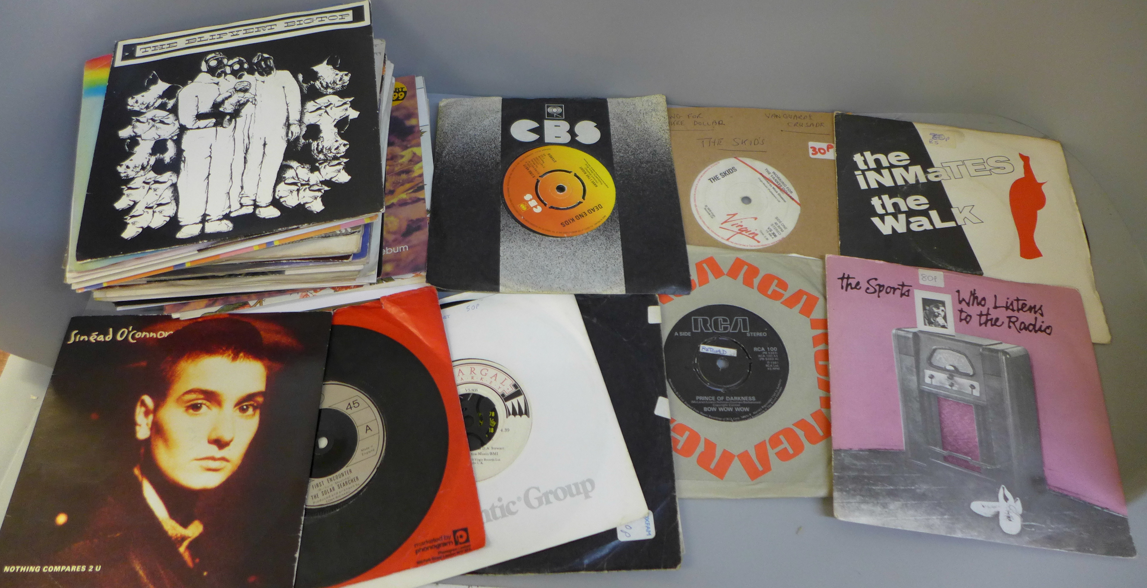 Fifty-five punk, new wave, pop and rock 7" singles, 1970's and 1980's