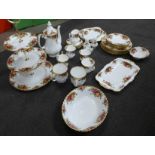 A Royal Albert Old Country Roses part coffee set, a three tier cakestand, tea plates, side plates,