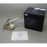 A Royal Crown Derby paperweight, Striped Dolphin, number 548 of a gold signature limited edition
