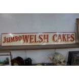 A painted wooden Jumbo Welsh Cakes sign