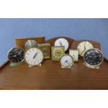 A collection of timepieces, including Metamec