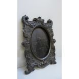 A French Gothic photograph frame, possibly Gutta Percha, 17cm x 22cm