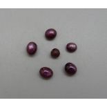 Six loose cabochon rubies