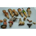 A collection of novelty bottle stoppers