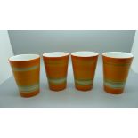 Four Shelley beakers in orange