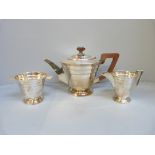 A Walker & Hall Art Deco three piece silver tea service, Sheffield 1944, 1074g