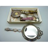 A French Champleve enamel mirror, spirit labels, penknives, whistles, etc.