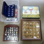 Two cases of collectors thimbles, souvenir spoons, place mats**PLEASE NOTE THIS LOT IS NOT